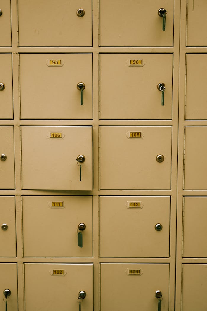 why-choose-us Close-up shot of numbered lockers with keys visible, ideal for security concepts.